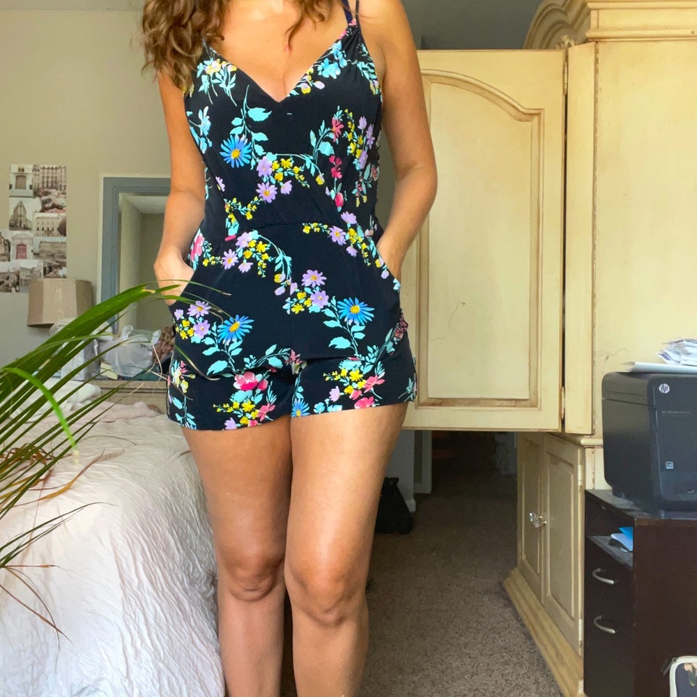 Yumi Kim floral romper with pockets.